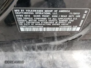 2014 Volkswagen Passat SE z VIN 1VWBT7A38EC049323, wystawiony jako Copart lot #57847025 z przebiegiem 86 241 mil mil oraz Tytuł czysty. Historia ofert i sprzedaży dostępna na DreamBid. Obrazek 12.