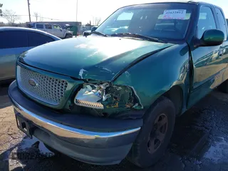 1999 Ford F-150 XL with VIN 1FTRX17L3XNC30010, listed as a IAAI auction lot 41632812 with 268,884 mi miles. Bid and sale history available at carsss.com. Image 6.