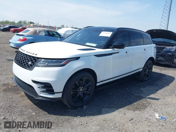 2020 Land Rover Range Rover Velar R-Dynamic S z VIN SALYK2EX4LA272072, wystawiony jako IAAI lot #41910957 z przebiegiem 63 823 mil mil oraz . Historia ofert i sprzedaży dostępna na DreamBid. Obrazek 18.