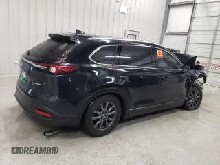 2021 Mazda CX-9 Touring with VIN JM3TCACY4M0523188, listed as a Copart auction lot 48595205 with 99,999 mi miles and Clean title. Bid and sale history available at DreamBid. Image 3.