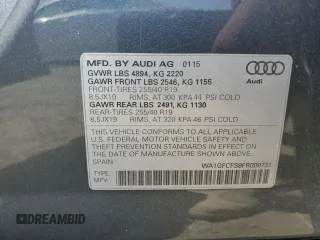2015 Audi Q3 Prestige with VIN WA1GFCFS8FR009731, listed as a Copart auction lot 59897225 with 84,138 mi miles and Salvage title. Bid and sale history available at DreamBid. Image 13.