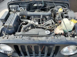 2002 Jeep Wrangler Sahara with VIN 1J4FA59S62P722411, listed as a Copart auction lot 74080364 with 0 mi miles and Non Repairable. Bid and sale history available at carsss.com. Image 11.
