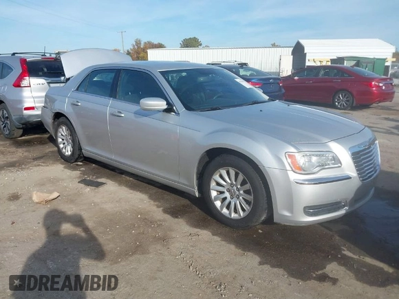 2012 Chrysler 300 with VIN 2C3CCAAG6CH104745, listed as a IAAI auction lot 40708856 with 125,186 mi miles. Bid and sale history available at carsss.com. Image 1.