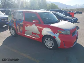 2008 Scion xB with VIN JTLKE50EX81014940, listed as a IAAI auction lot 42047009 with 130,863 mi miles. Bid and sale history available at carsss.com. Image 1.