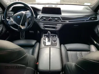 2018 BMW 7 Series 740e xDrive with VIN WBA7J2C57JG938291, listed as a Copart auction lot 58337763 with 53,259 mi miles and . Bid and sale history available at DreamBid. Image 8.