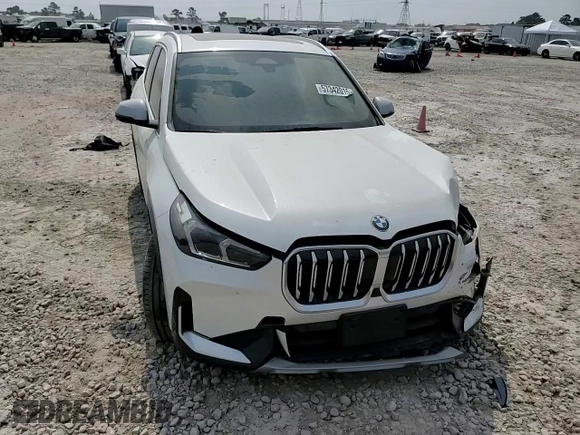 2023 BMW X1 xDrive28i with VIN WBX73EF06P5V77660, listed as a Copart auction lot 57342015 with 32,028 mi miles and Salvage title. Bid and sale history available at DreamBid. Image 14.