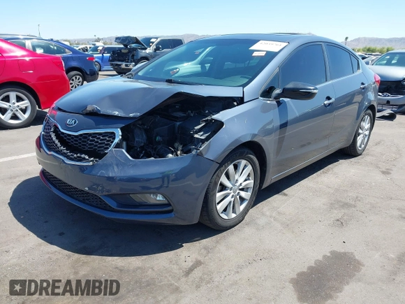 2014 Kia Forte EX with VIN KNAFX4A84E5112910, listed as a IAAI auction lot 42039761 with 118,126 mi miles. Bid and sale history available at carsss.com. Image 2.