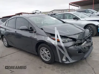 2018 Toyota Prius Plus with VIN JTDKARFPXJ3087064, listed as a IAAI auction lot 41433495 with 118,298 mi miles and . Bid and sale history available at DreamBid. Image 13.