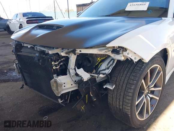 2023 Dodge Charger R/T with VIN 2C3CDXCT1PH651230, listed as a IAAI auction lot 41656860 with 11,817 mi miles and . Bid and sale history available at DreamBid. Image 6.