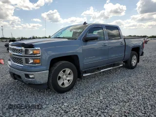 2015 Chevrolet Silverado 1500 LT with VIN 3GCUKREC8FG284565, listed as a Copart auction lot 52760805 with 128,501 mi miles and Salvage Title. Bid and sale history available at DreamBid. Image 1.