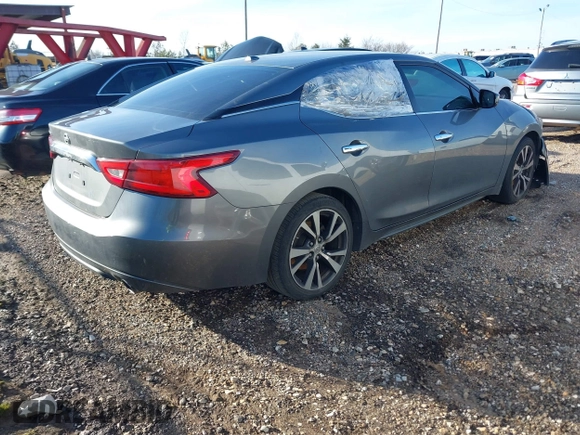 2016 Nissan Maxima Platinum with VIN 1N4AA6APXGC438961, listed as a IAAI auction lot 41535350 with 194,701 mi miles and . Bid and sale history available at DreamBid. Image 4.