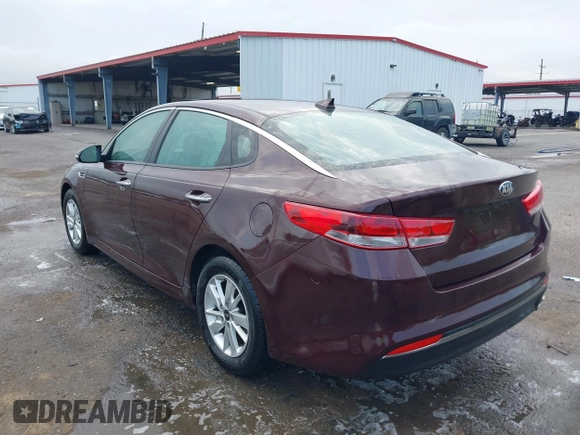 2016 Kia Optima LX with VIN 5XXGT4L32GG105361, listed as a IAAI auction lot 42066431 with 61,026 mi miles. Bid and sale history available at carsss.com. Image 3.