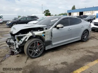 2023 Kia Stinger GT2 with VIN KNAE55LC7P6127116, listed as a Copart auction lot 67474704 with 36,569 mi miles and Salvage Title. Bid and sale history available at carsss.com. Image 1.