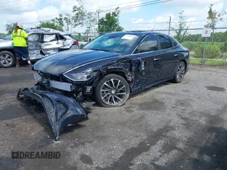 2023 Hyundai Sonata Limited z VIN KMHL34J2XPA262877, wystawiony jako IAAI lot #42450105 z przebiegiem 33 103 mil mil oraz . Historia ofert i sprzedaży dostępna na DreamBid. Obrazek 2.