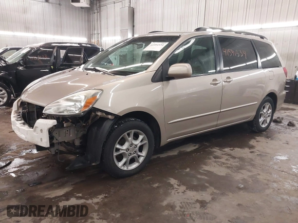 2005 Toyota Sienna XLE with VIN 5TDBA22C85S047371, listed as a IAAI auction lot 41591534 with 185,209 mi miles and . Bid and sale history available at DreamBid. Image 2.