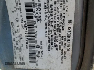 2005 Ford Taurus SEL with VIN 1FAFP56215A234943, listed as a Copart auction lot 51486595 with 222,307 mi miles and Salvage Title. Bid and sale history available at DreamBid. Image 12.