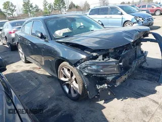 2015 Dodge Charger RT with VIN 2C3CDXCT4FH765494, listed as a IAAI auction lot 41683083 with 129,209 mi miles and . Bid and sale history available at DreamBid. Image 1.