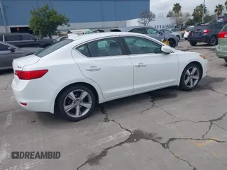2014 Acura ILX with VIN 19VDE1F34EE000679, listed as a IAAI auction lot 41799014 with 136,514 mi miles. Bid and sale history available at carsss.com. Image 4.