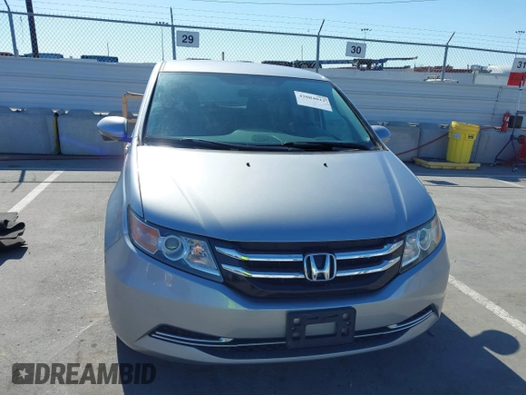 2016 Honda Odyssey SE with VIN 5FNRL5H32GB153002, listed as a IAAI auction lot 42084022 with 63,764 mi miles and . Bid and sale history available at DreamBid. Image 12.