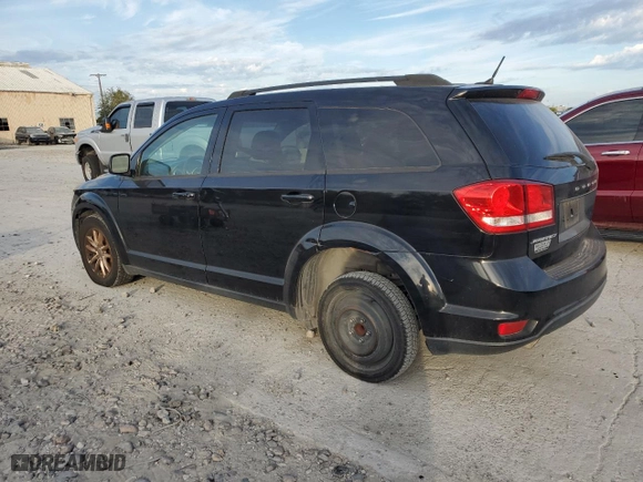 2017 Dodge Journey SXT with VIN 3C4PDCBG1HT510712, listed as a Copart auction lot 77676784 with 130,448 mi miles and Salvage Title. Bid and sale history available at carsss.com. Image 2.