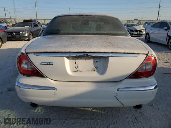 2004 Jaguar XJ with VIN SAJWA71CX4SG21334, listed as a Copart auction lot 70946034 with 0 mi miles and Clean Title. Bid and sale history available at carsss.com. Image 6.