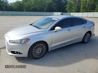2014 Ford Fusion Titanium с VIN 3FA6P0K99ER332078, выставлен на аукционе Copart как лот 60130085 с пробегом 115 541 миль миль и Списание • Salvage title. История ставок и продаж доступна на DreamBid. Изображение 1.