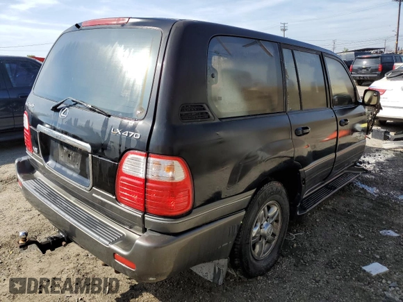 2001 Lexus LX 470 with VIN JTJHT00W613504449, listed as a Copart auction lot 45995455 with 229,056 mi miles and Salvage Title. Bid and sale history available at DreamBid. Image 3.