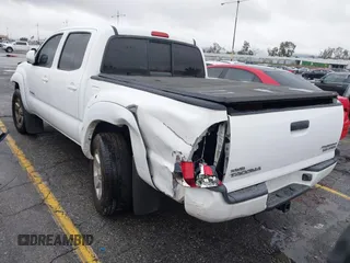 2009 Toyota Tacoma PreRunner with VIN 3TMJU62NX9M078106, listed as a IAAI auction lot 41768489 with 83,360 mi miles. Bid and sale history available at carsss.com. Image 3.