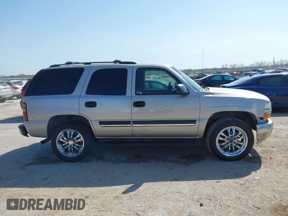 2004 Chevrolet Tahoe LT with VIN 1GNEC13Z84J315648, listed as a IAAI auction lot 41868112 with 198,901 mi miles. Bid and sale history available at carsss.com. Image 13.