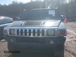 2003 Hummer H2 with VIN 5GRGN23U33H144379, listed as a IAAI auction lot 41452982 with 227,746 mi miles. Bid and sale history available at carsss.com. Image 6.