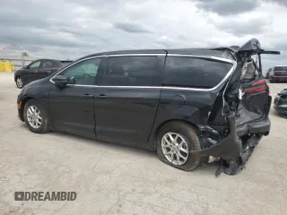 2023 Chrysler Pacifica Touring L with VIN 2C4RC1BG4PR621126, listed as a Copart auction lot 56694085 with 42,659 mi miles and Salvage title. Bid and sale history available at DreamBid. Image 2.