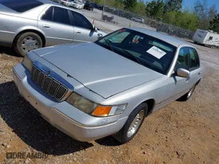 1998 Mercury Grand Marquis LS with VIN 2MEFM75W6WX669533, listed as a IAAI auction lot 41896982 with 153,155 mi miles. Bid and sale history available at carsss.com. Image 2.