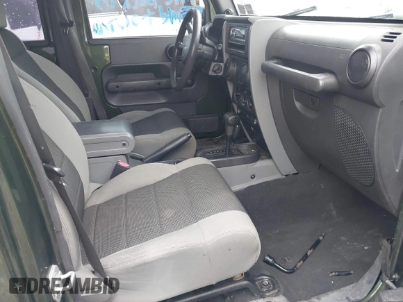 2007 Jeep Wrangler Unlimited X with VIN 1J4GA39127L231378, listed as a IAAI auction lot 42252475 with 152,568 mi miles and . Bid and sale history available at DreamBid. Image 5.
