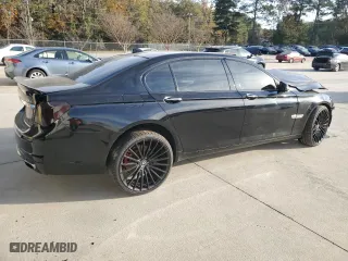 2011 BMW 7 Series 740Li with VIN WBAKB4C54BC574973, listed as a Copart auction lot 82299024 with 0 mi miles and Salvage Title. Bid and sale history available at carsss.com. Image 3.