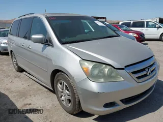 2005 Honda Odyssey EX-L z VIN 5FNRL38765B135803, wystawiony jako IAAI lot #42421288 z przebiegiem 185 043 mil mil oraz . Historia ofert i sprzedaży dostępna na DreamBid. Obrazek 1.