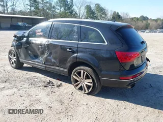 2014 Audi Q7 3.0T Premium Plus with VIN WA1LGAFE0ED005551, listed as a IAAI auction lot 41687305 with 104,691 mi miles. Bid and sale history available at carsss.com. Image 3.