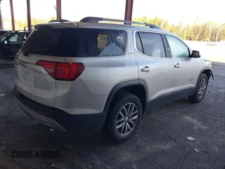 2017 GMC Acadia SLE with VIN 1GKKNLLS7HZ291097, listed as a IAAI auction lot 40665634 with 76,860 mi miles. Bid and sale history available at carsss.com. Image 4.