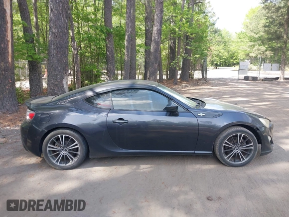 2013 Scion FR-S with VIN JF1ZNAA12D1718693, listed as a IAAI auction lot 42077260 with 110,164 mi miles. Bid and sale history available at carsss.com. Image 13.