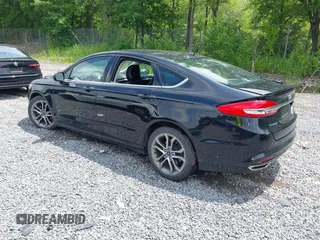 2017 Ford Fusion SE with VIN 3FA6P0H98HR331628, listed as a IAAI auction lot 42730977 with 47,248 mi miles and . Bid and sale history available at DreamBid. Image 3.
