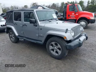 2016 Jeep Wrangler Unlimited 75th Anniversary with VIN 1C4BJWEG7GL162716, listed as a IAAI auction lot 41979882 with 77,034 mi miles. Bid and sale history available at carsss.com. Image 1.