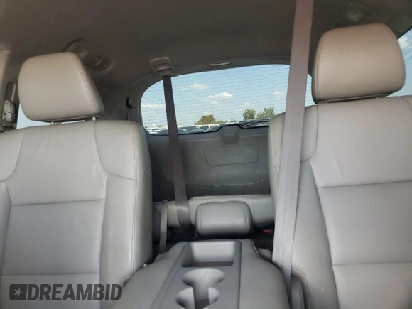 2012 Honda Odyssey Touring with VIN 5FNRL5H94CB009952, listed as a Copart auction lot 54322695 with 135,551 mi miles and Salvage title. Bid and sale history available at DreamBid. Image 10.