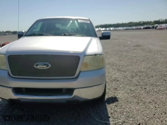 2005 Ford F-150 XLT z VIN 1FTPX125X5FB26699, wystawiony jako Copart lot #57386895 z przebiegiem 151 295 mil mil oraz Szkoda całkowita • Salvage title. Historia ofert i sprzedaży dostępna na DreamBid. Obrazek 13.
