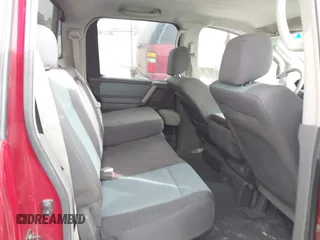 2005 Nissan Titan XE with VIN 1N6AA07A95N514937, listed as a IAAI auction lot 41319161 with 163,556 mi miles and . Bid and sale history available at DreamBid. Image 8.