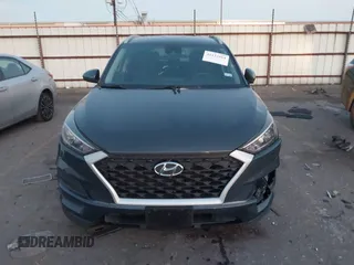 2019 Hyundai Tucson Sport with VIN KM8J33AL7KU901296, listed as a IAAI auction lot 41132884 with 76,948 mi miles. Bid and sale history available at carsss.com. Image 12.