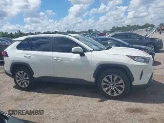 2021 Toyota RAV4 XLE Premium with VIN 2T3C1RFV0MW107651, listed as a IAAI auction lot 42558254 with 68,286 mi miles and . Bid and sale history available at DreamBid. Image 13.