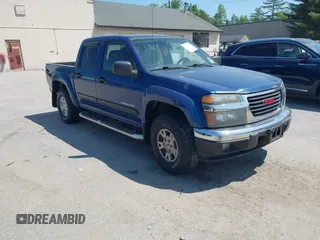 2005 GMC Canyon 1SF SLE Z71 z VIN 1GTDT136858196745, wystawiony jako IAAI lot #42401513 z przebiegiem 154 387 mil mil oraz . Historia ofert i sprzedaży dostępna na DreamBid. Obrazek 1.