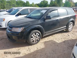 2014 Dodge Journey SE with VIN 3C4PDCAB7ET170340, listed as a IAAI auction lot 42078834 with 215,084 mi miles and . Bid and sale history available at carsss.com. Image 2.