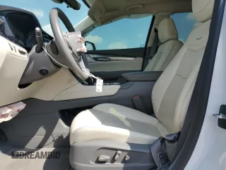 2023 Cadillac XT5 FWD Premium Luxury with VIN 1GYKNCRS7PZ150378, listed as a Copart auction lot 71792184 with 21,631 mi miles and Salvage Title. Bid and sale history available at carsss.com. Image 7.