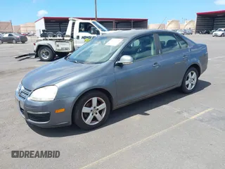2009 Volkswagen Jetta S с VIN 3VWJZ71K09M089563, выставлен на аукционе IAAI как лот 42207932 с пробегом 207 719 миль миль и . История ставок и продаж доступна на DreamBid. Изображение 2.