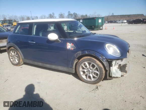 2014 MINI Hardtop with VIN WMWXM5C56ET972955, listed as a Copart auction lot 48160225 with 60,692 mi miles and Clean Title. Bid and sale history available at DreamBid. Image 4.